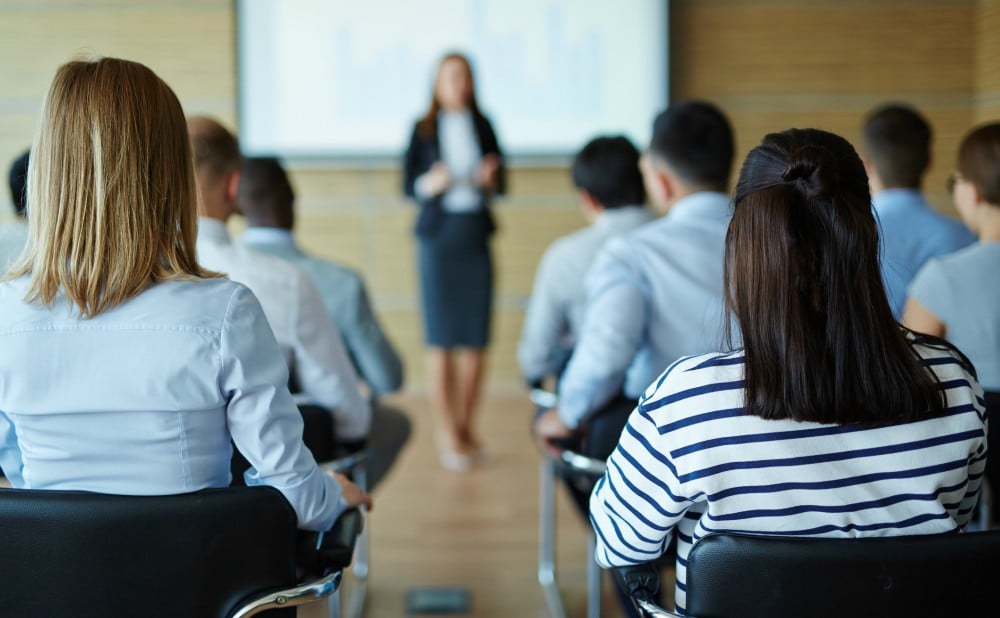 woman-teaching-investing-real-estate