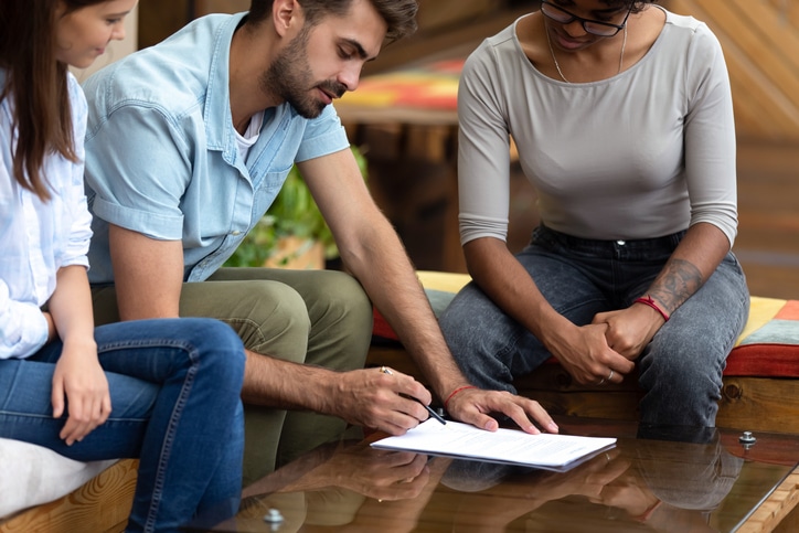 Newly Moved-In Couple Signs a Lease Option